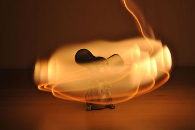 Close-up of glass over black background