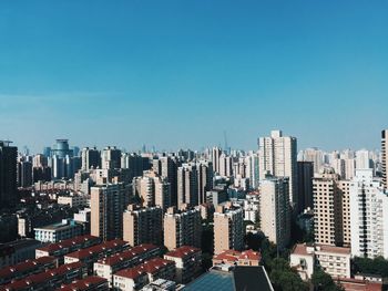 View of cityscape against clear sky