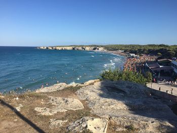 High angle view of beach against clear blue sky
