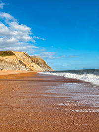 Scenic view of beach against sky