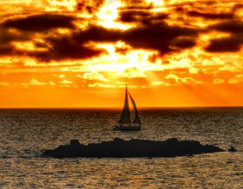 Scenic view of sea at sunset