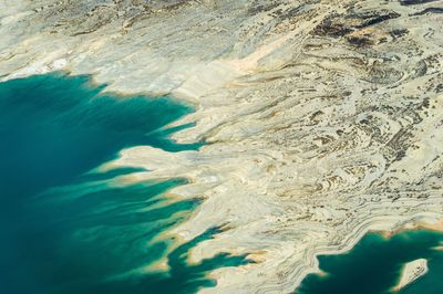 Aerial view of colorado river by desert