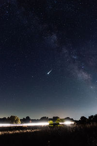 Scenic view of star field against sky at night