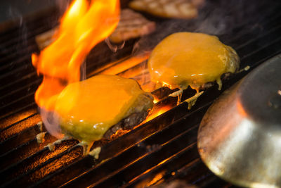 Close-up of meat on barbecue