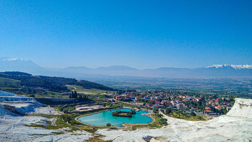 High angle view of swimming pool from cotton castle which is located in pamukkale, turkey.