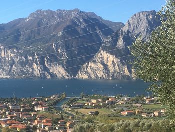 High angle view of buildings and mountains against sky