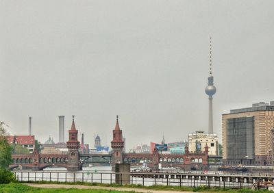 View of communications tower in city