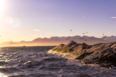 Scenic view of sea against sky during sunset