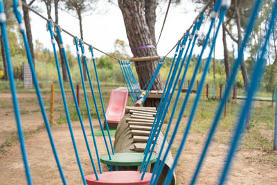 Wooden suspension bridge at park