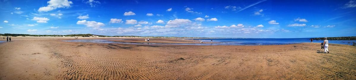 Panoramic view of beach against sky