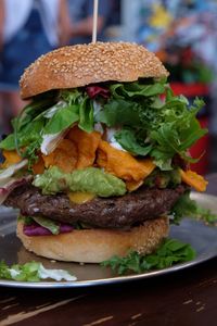 Close-up of burger on plate at table