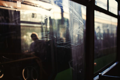 Reflection of train on glass