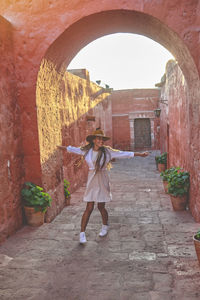 Young tourists dancing in santa catalina monastery, convento de santa catalina, arequipa, peru. 