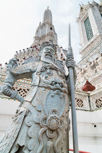 Low angle view of sculpture of building