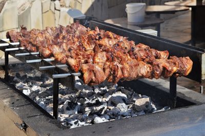 Close-up of meat on barbecue grill