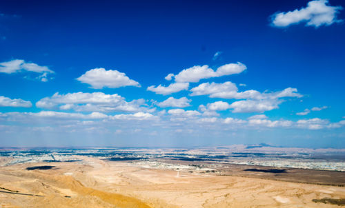 Scenic view of sea against blue sky