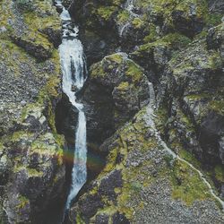 Close-up of waterfall amidst rocks