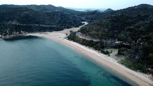 High angle view of sea and mountains