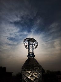 Low angle view of sculpture against sky at sunset