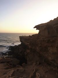 Scenic view of sea at sunset