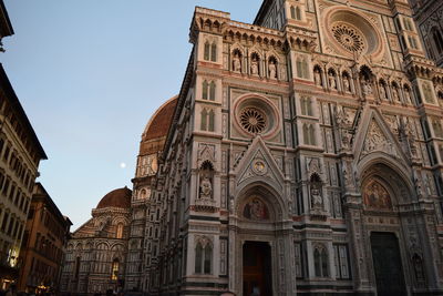 Low angle view of ornate building against sky