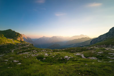 Scenic view of mountains against sky during sunset