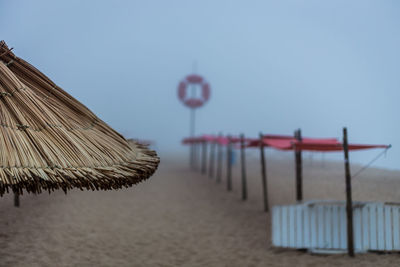 Beach umbrella against clear sky