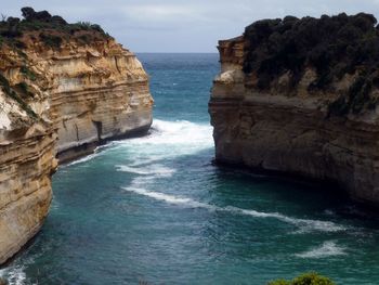 Scenic view of sea against cloudy sky