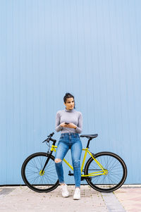 Portrait of man sitting on bicycle