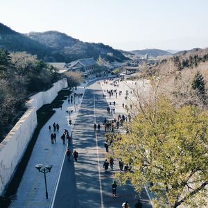 High angle view of people on street by mountains