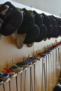 Close-up of clothes hanging on wood