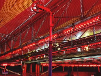 Low angle view of illuminated ceiling at night