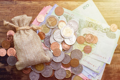 High angle view of coins on table