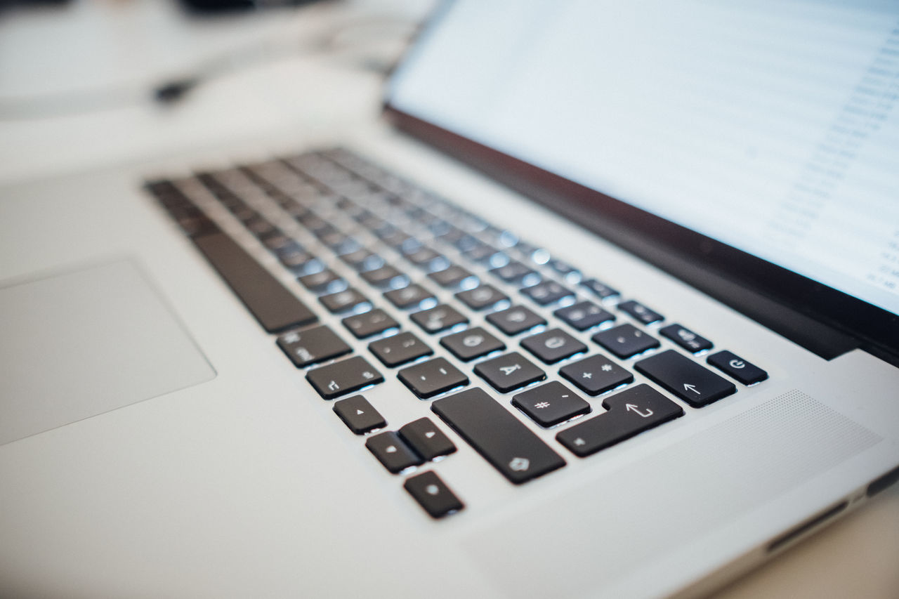 HIGH ANGLE VIEW OF LAPTOP KEYBOARD