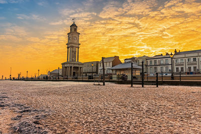 View of buildings at sunset