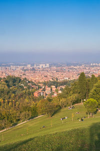 Aerial view of townscape against sky