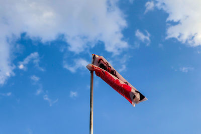 Low angle view of a bird flying in sky