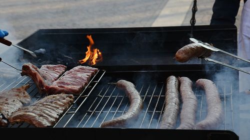 Close-up of meat on barbecue grill