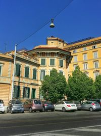 Low angle view of buildings against clear sky