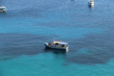 Boats sailing in sea