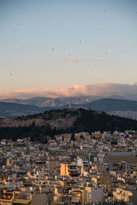 High angle view of townscape against sky during sunset