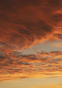 Low angle view of dramatic sky during sunset