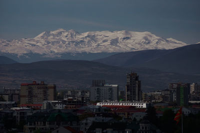 Scenic view of snowcapped mountains against sky