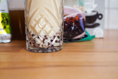 Close-up of drink in jar on table