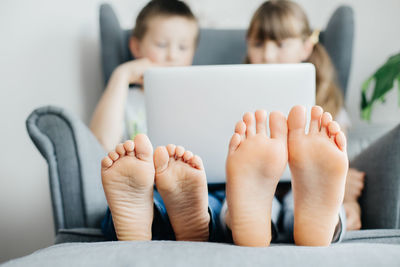 Children study online at home or make a video call through a laptop. communication 