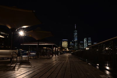 Illuminated city buildings at night