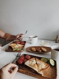 Cropped image of man having breakfast