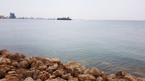 Scenic view of sea against clear sky