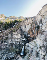 Scenic view of rocky mountains against clear sky