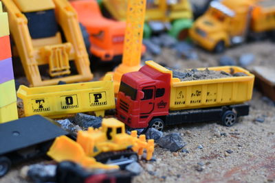 Close-up of toy cars on land